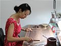 巧用科技注新思——记青年紫砂陶艺家张燚